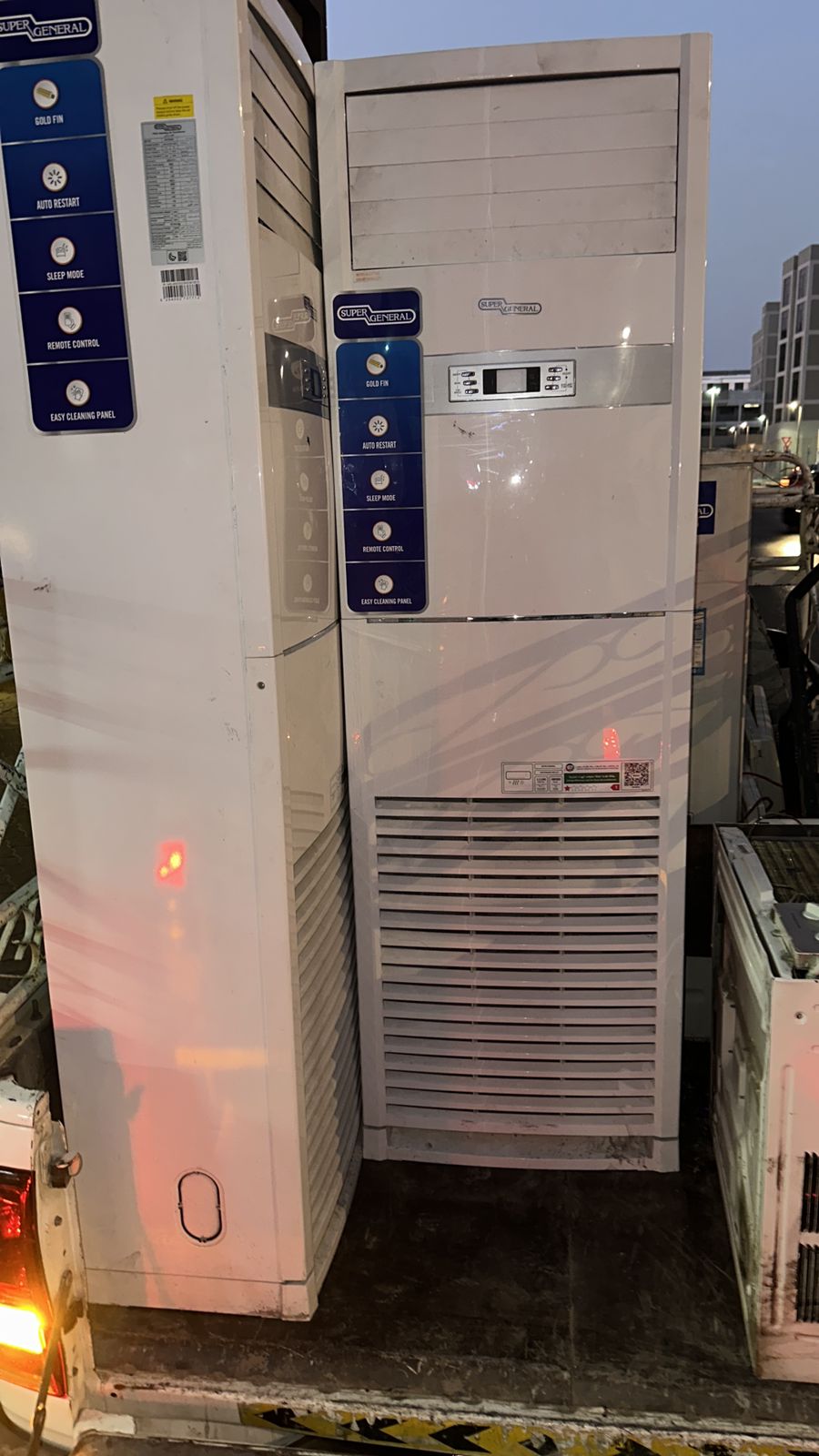 Floor standing AC loaded on truck for free pickup by our team in Dubai