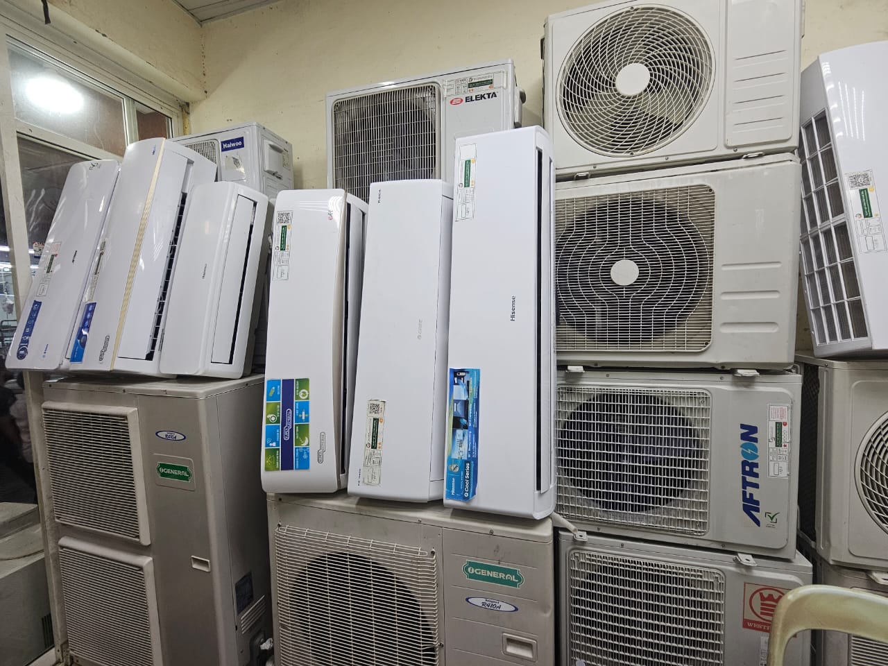Used and scrap AC buyer shop in Deira Dubai - split window and outdoor AC units in stock